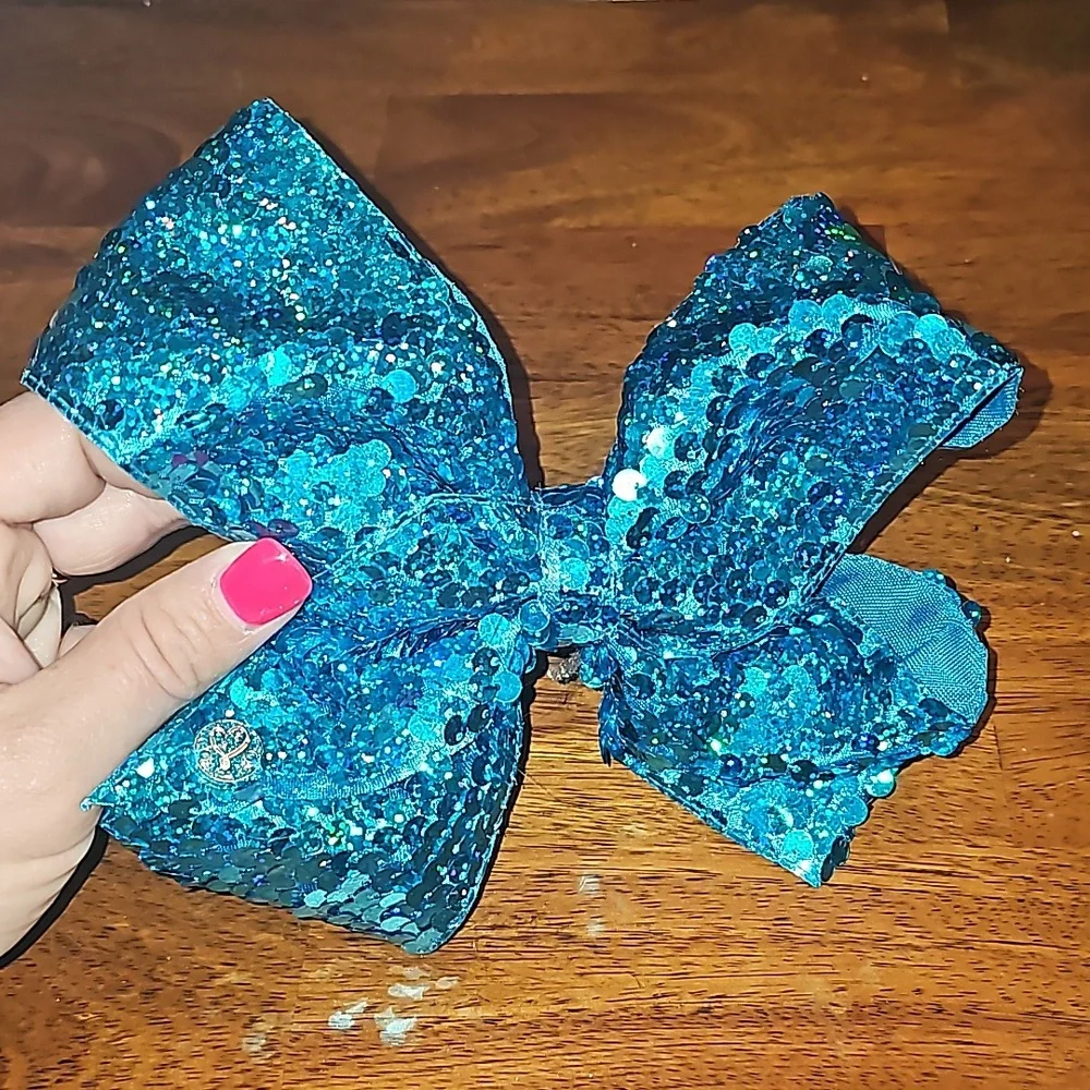 Like New girls JoJo Siwa blue/teal sequined large bow. BEAUTIFUL